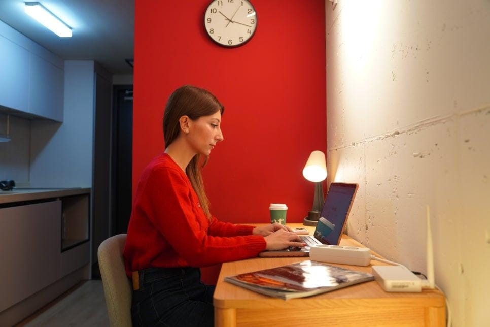 Raquel working on creator tasks in her room